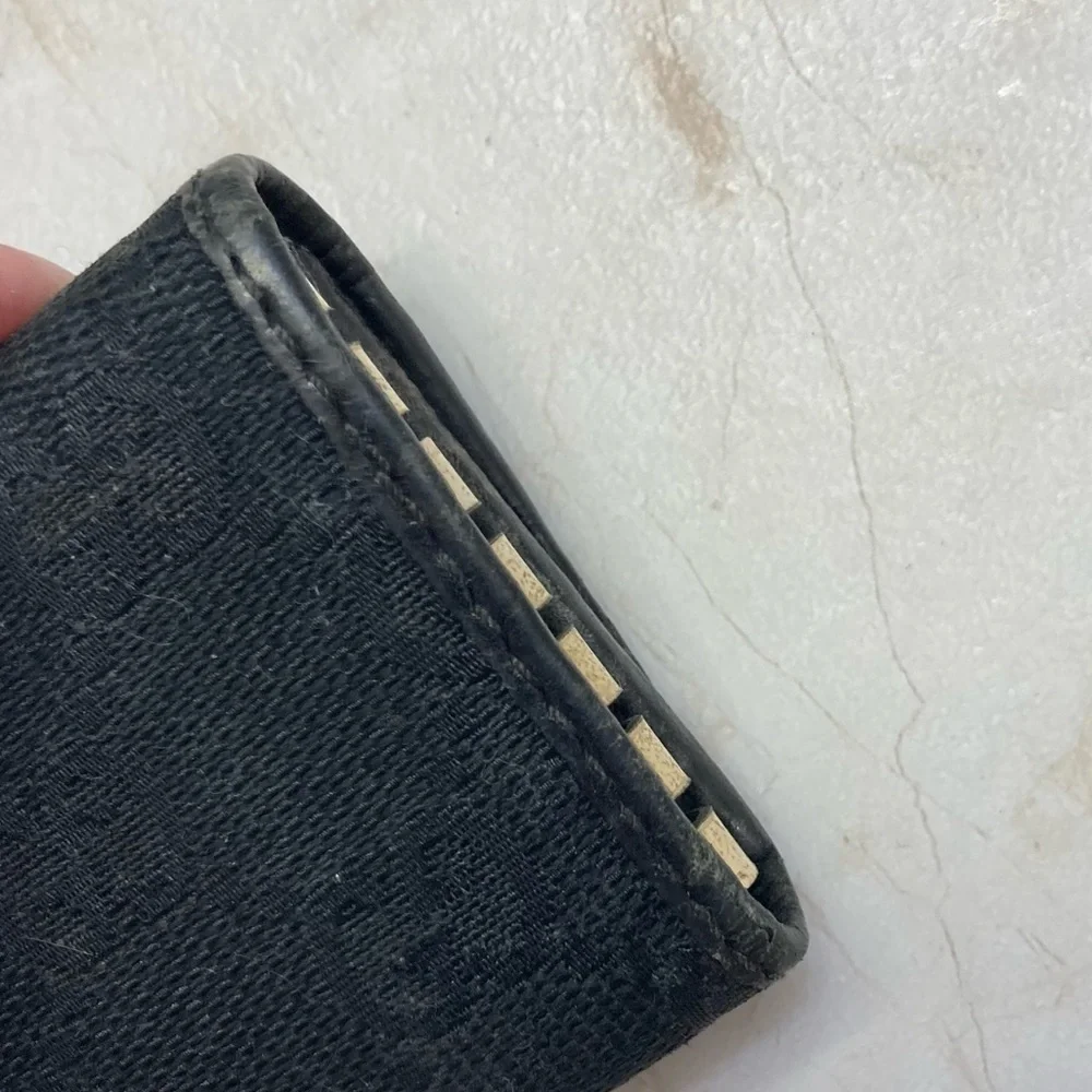 Gucci black signature canvas leather key holder